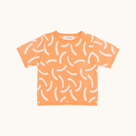 KNITTED BRUSH ORGANIC TEE – CORAL/CREAM; 100% Organic Cotton; Made from GOTS-certified organic cotton; 'BRUSH' Jacquard pattern; Rolled edge at the neckband; Rib finish at hem and cuffs; Dropped shoulder; Relaxed fit