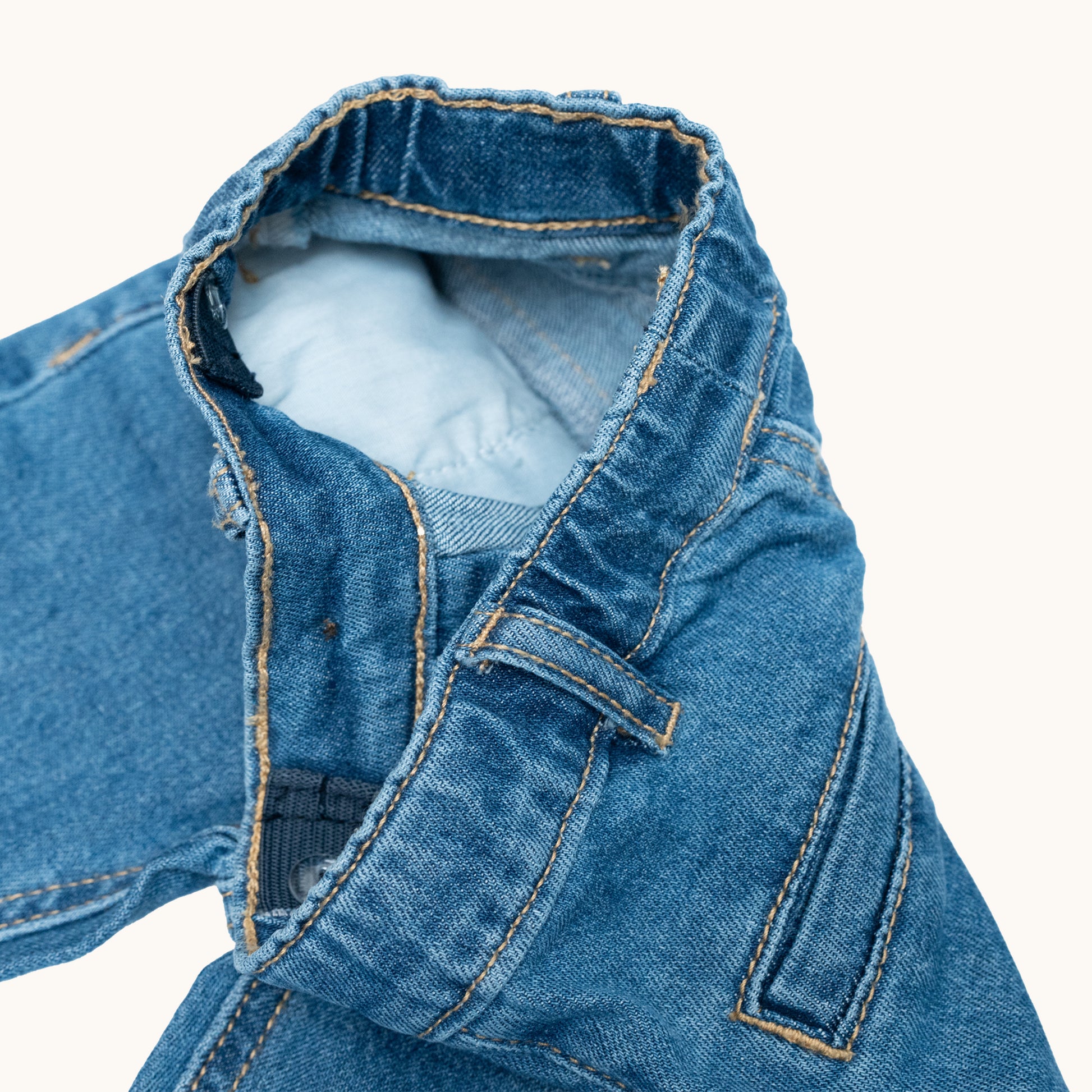 EVERYDAY DENIM JEANS; 100% Organic Cotton; Soft stretch denim with mock zip fly; Five-pocket style; Adjustable elasticated waist with belt loops; Folded cuffs allow for adjustable length of jeans.