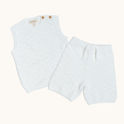 KNITTED BERMUDA SHORTS - CREAM; 100% Organic Cotton; Shorts made from GOTS-certified organic cotton; Elasticated waistband; Relaxed fit.