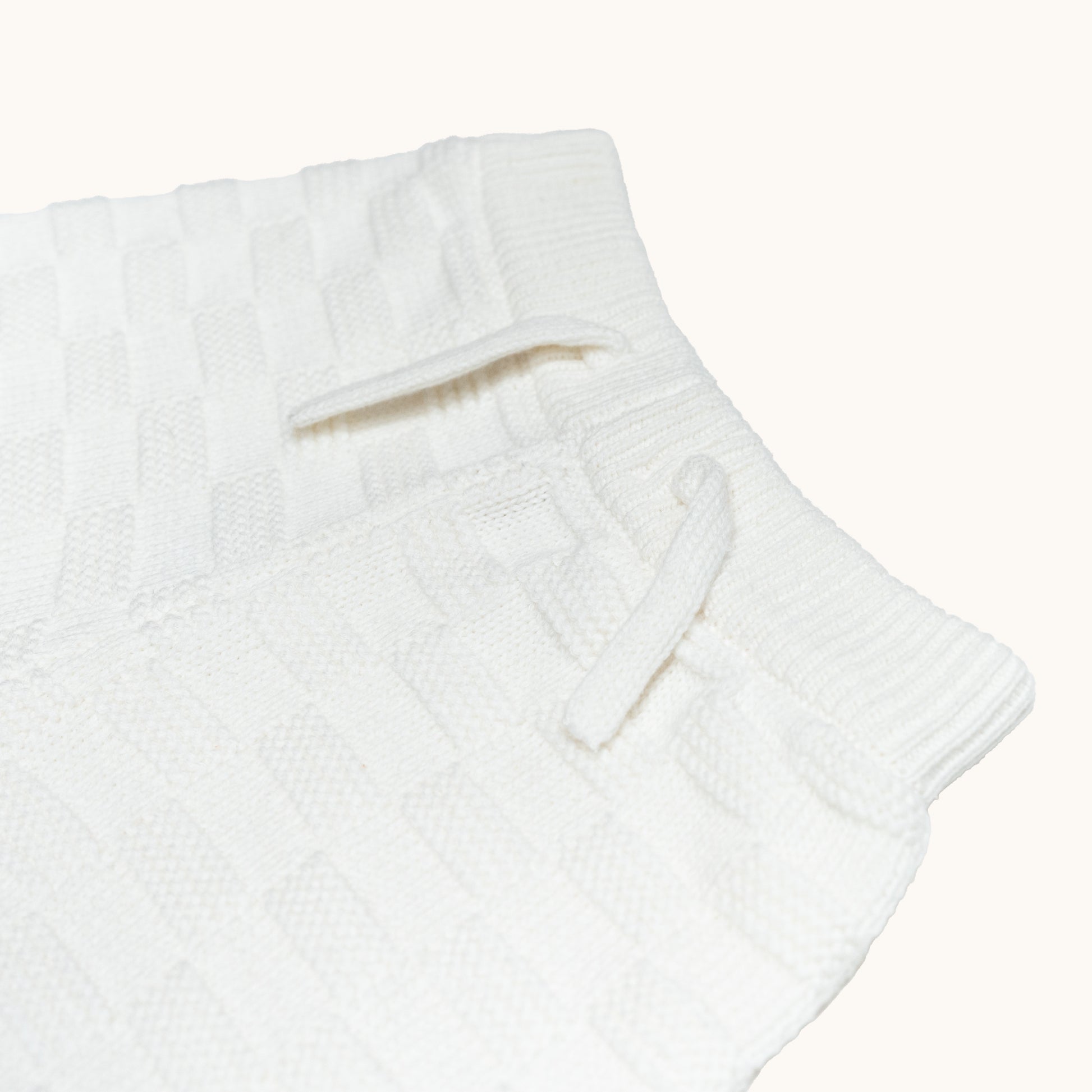 KNITTED BERMUDA SHORTS - CREAM; 100% Organic Cotton; Shorts made from GOTS-certified organic cotton; Elasticated waistband; Relaxed fit.