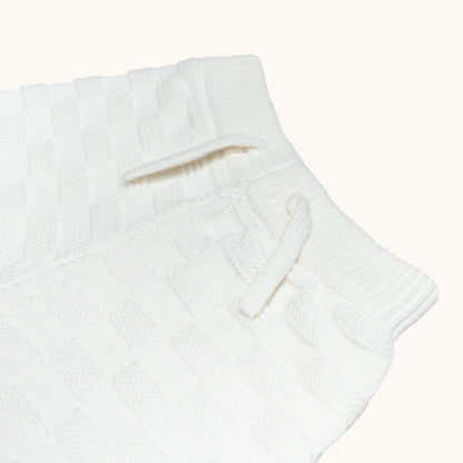KNITTED BERMUDA SHORTS - CREAM; 100% Organic Cotton; Shorts made from GOTS-certified organic cotton; Elasticated waistband; Relaxed fit.
