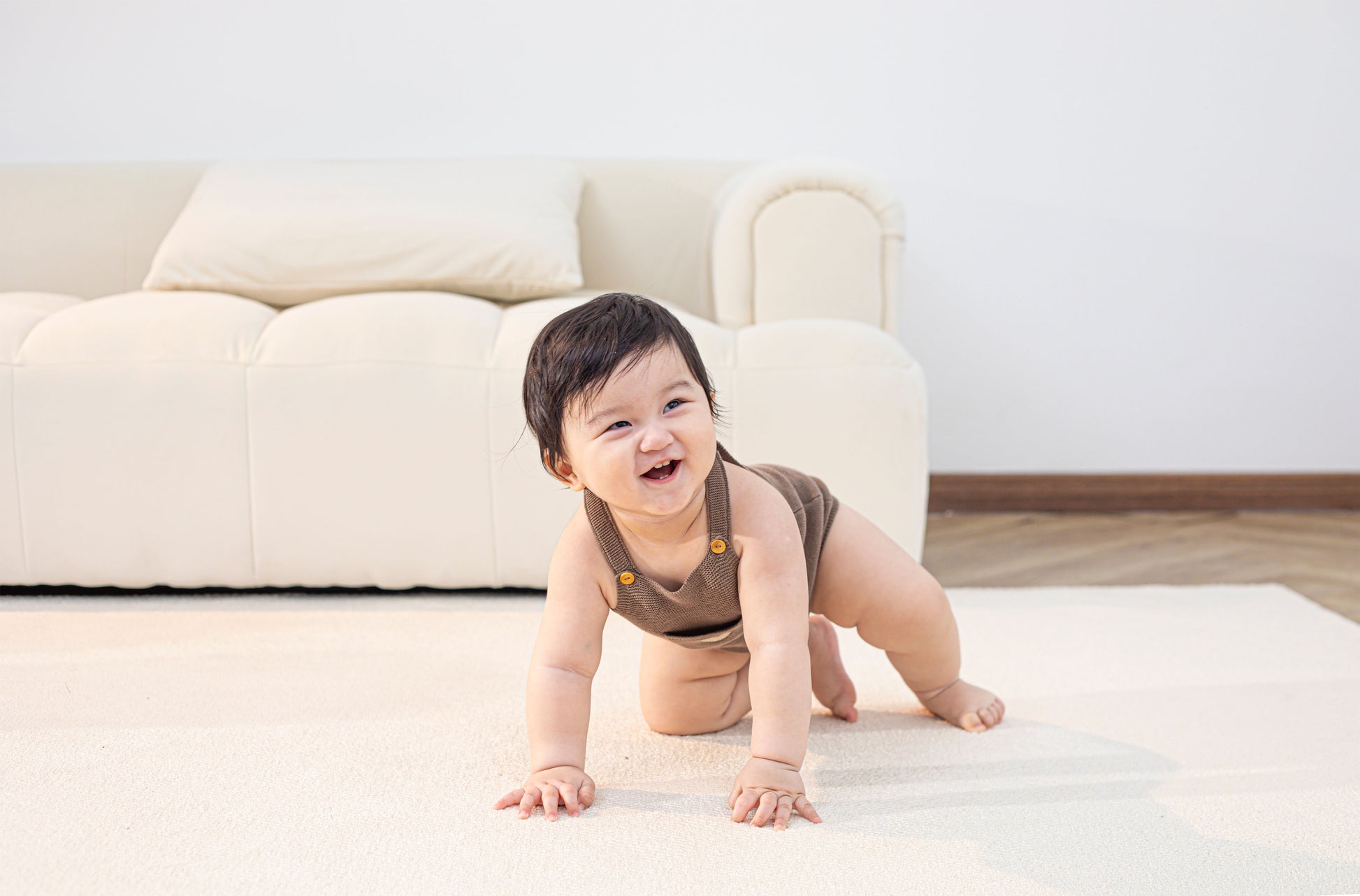 KNITTED SINGLESUIT - CHOCO; 100% Organic Cotton; Jacquard singletsuit made from GOTS-certified organic cotton; Features convenient press snaps at the crotch for effortless dressing; Rib finish and neck, armholes and leg opening.
