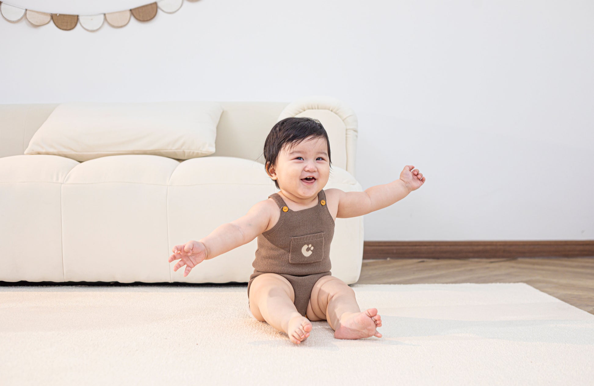 KNITTED SINGLESUIT - CHOCO; 100% Organic Cotton; Jacquard singletsuit made from GOTS-certified organic cotton; Features convenient press snaps at the crotch for effortless dressing; Rib finish and neck, armholes and leg opening.