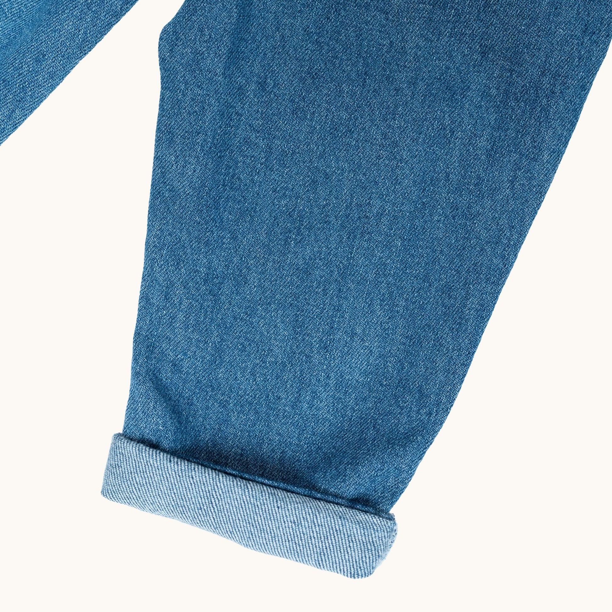 EVERYDAY DENIM JEANS; 100% Organic Cotton; Soft stretch denim with mock zip fly; Five-pocket style; Adjustable elasticated waist with belt loops; Folded cuffs allow for adjustable length of jeans.