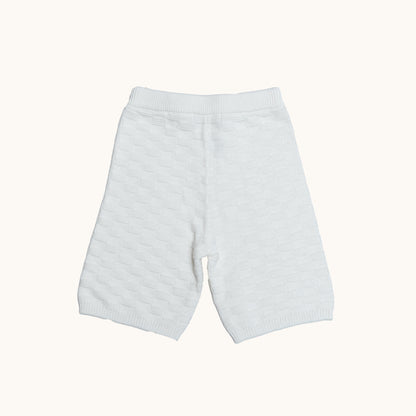 KNITTED BERMUDA SHORTS - CREAM; 100% Organic Cotton; Shorts made from GOTS-certified organic cotton; Elasticated waistband; Relaxed fit.