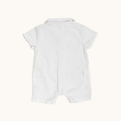 ORGANIC COLLAR JERSEY ROMPERS; 100% Organic Cotton Twill; Made from GOTS-certified organic cotton twill; Press snaps at front and crotch for easy dressing; Patch pockets at the sides; Relaxed fit. 