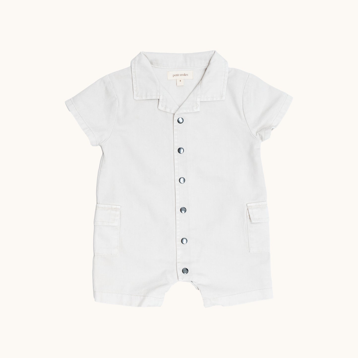 ORGANIC COLLAR JERSEY ROMPERS; 100% Organic Cotton Twill; Made from GOTS-certified organic cotton twill; Press snaps at front and crotch for easy dressing; Patch pockets at the sides; Relaxed fit. 