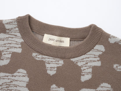 KNITTED SPOTS PULL OVER - CHOCO; 100% Organic Cotton; Jacquard Pull Over made from GOTS-certified organic cotton; 'Choco Spots' Jacquard pattern; Rib finish at neck, cuffs and hem; Dropped shoulder; Relaxed fit. 