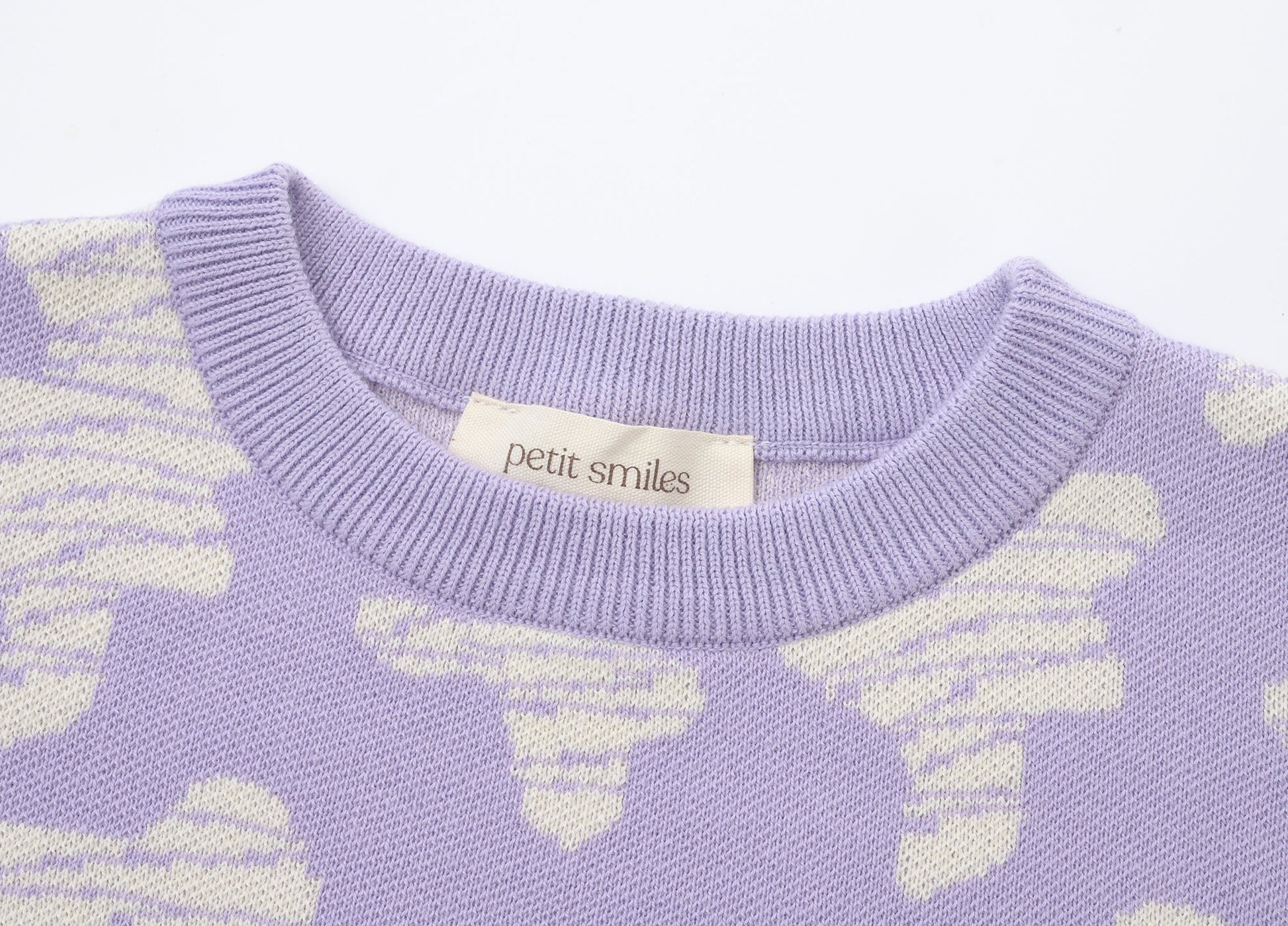 KNITTED SPOTS PULL OVER WITH PANT - TARO; 100% Organic Cotton; Jacquard Pull Over made from GOTS-certified organic cotton; 'Taro Spots' Jacquard pattern; Rib finish at neck, cuffs and hem; Dropped shoulder; Relaxed fit.