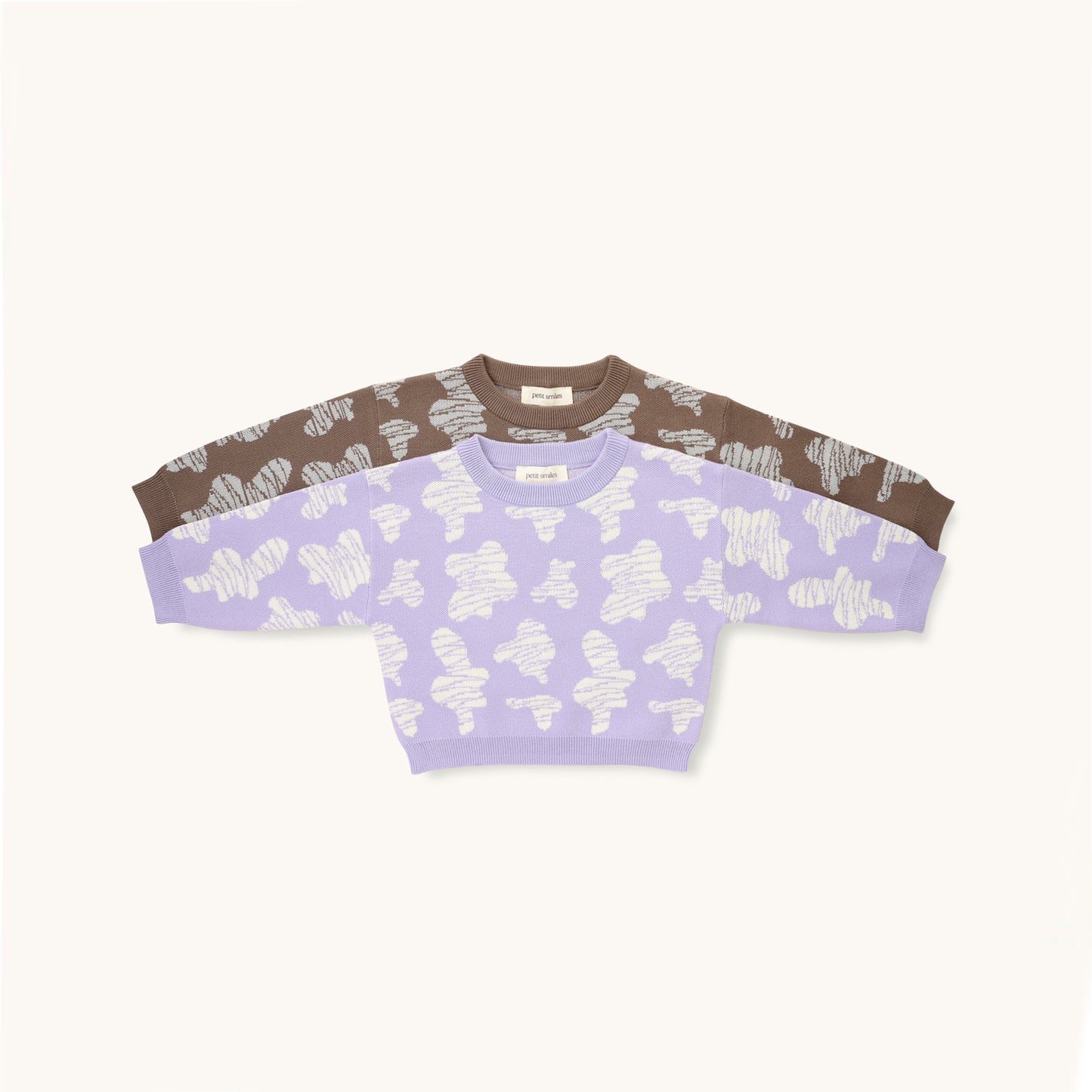 KNITTED SPOTS PULL OVER - CHOCO; 100% Organic Cotton; Jacquard Pull Over made from GOTS-certified organic cotton; 'Choco Spots' Jacquard pattern; Rib finish at neck, cuffs and hem; Dropped shoulder; Relaxed fit. 