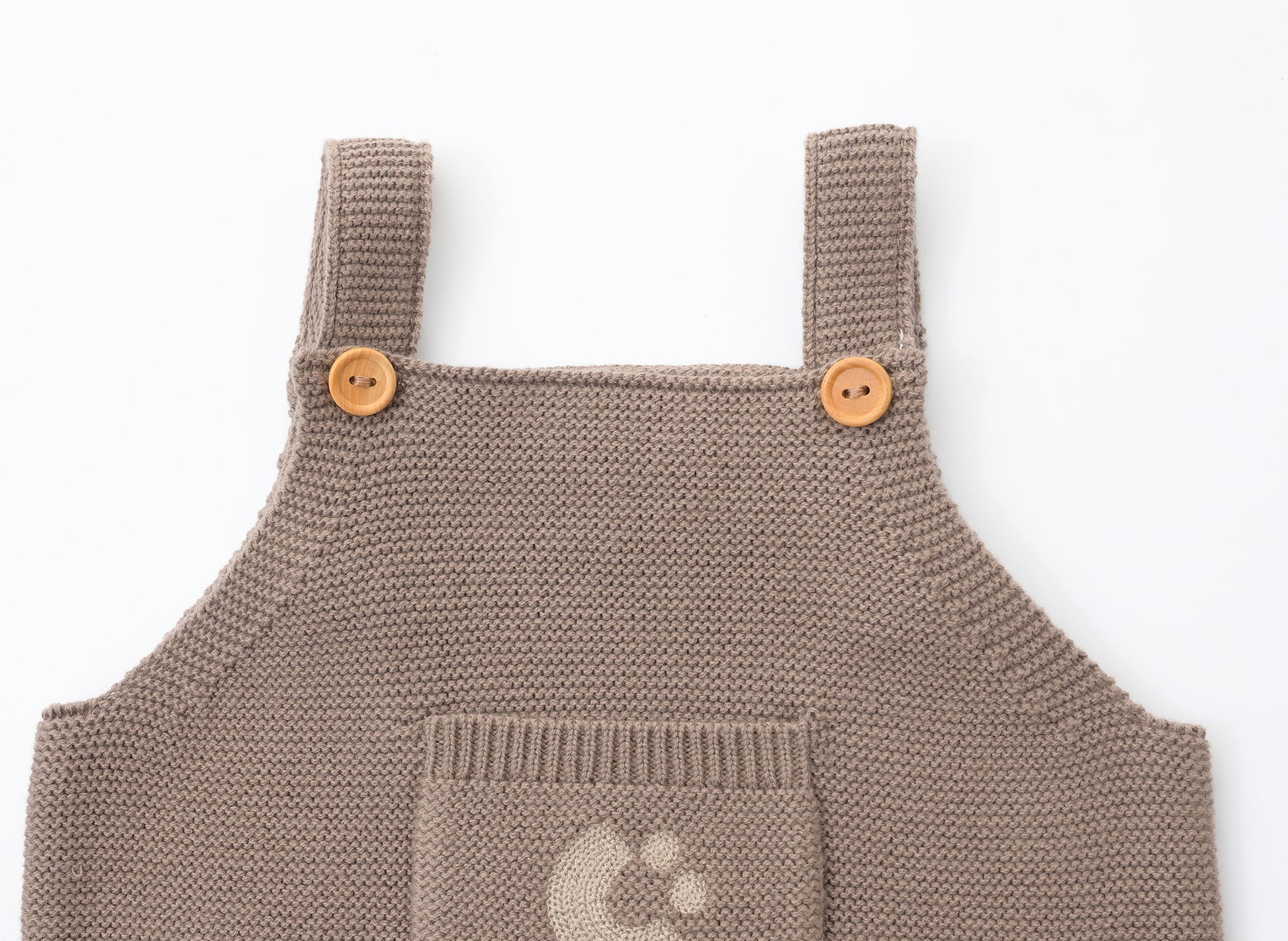 KNITTED SINGLESUIT - CHOCO; 100% Organic Cotton; Jacquard singletsuit made from GOTS-certified organic cotton; Features convenient press snaps at the crotch for effortless dressing; Rib finish and neck, armholes and leg opening.