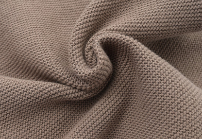 KNITTED SINGLESUIT - CHOCO; 100% Organic Cotton; Jacquard singletsuit made from GOTS-certified organic cotton; Features convenient press snaps at the crotch for effortless dressing; Rib finish and neck, armholes and leg opening.