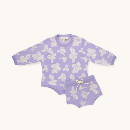KNITTED SPOTS ROMPER - TARO; 100% Organic Cotton; Jacquard Romper made from GOTS-certified organic cotton; 'TARO SPOTS' Jacquard pattern; Rib hem at neck, cuffs and leg opening; Features convenient press snaps at the crotch for effortless dressing; Oversized fit.